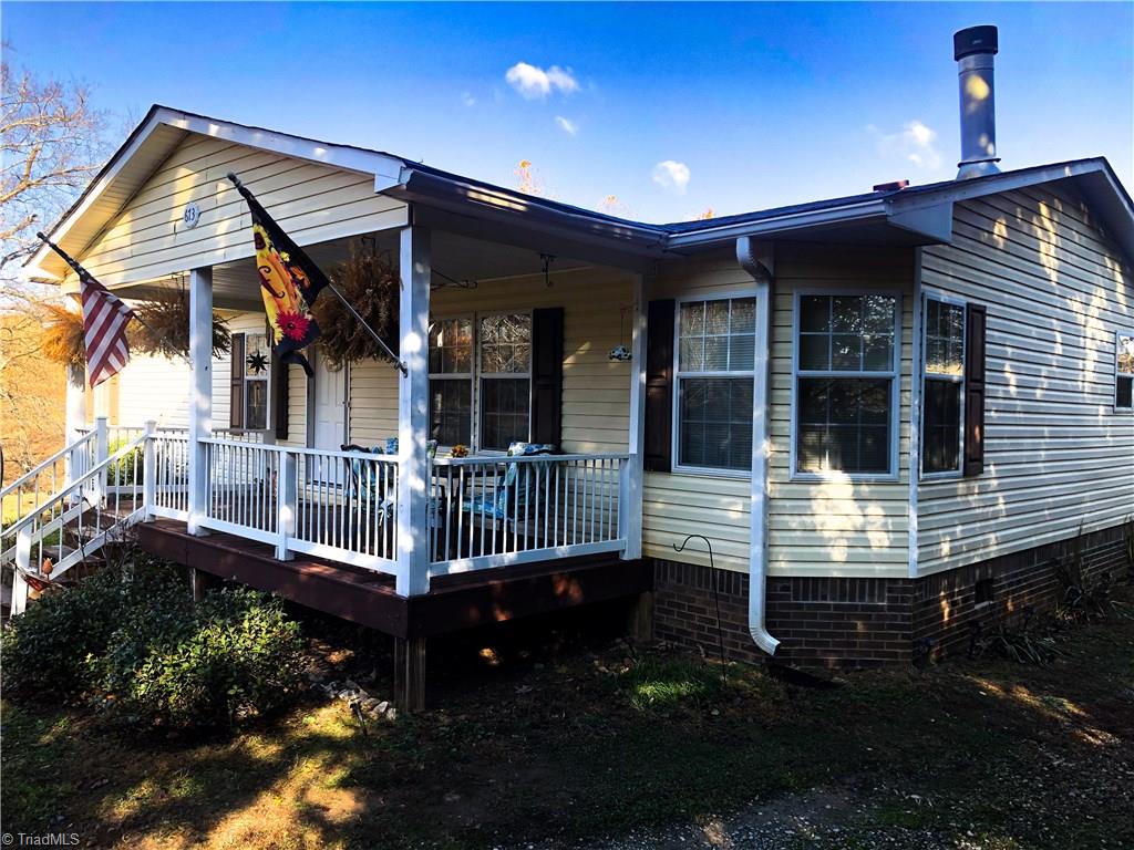 673 Mt Zion Road Pinnacle, NC 27043 - Photo 2 of 26 Side view of front of home
