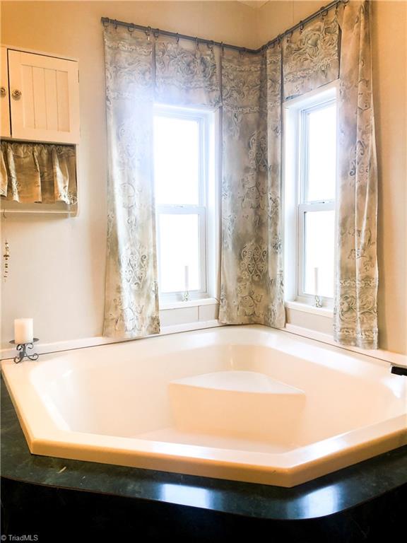 673 Mt Zion Road Pinnacle, NC 27043 - Photo 14 of 26 Tub in Master bath