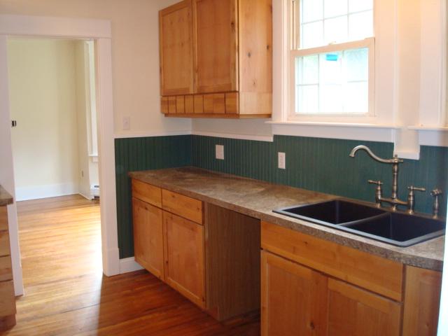 270 Huntington Road Chester, MA 01011 - Photo 3 of 9 a kitchen with a sink and cabinets