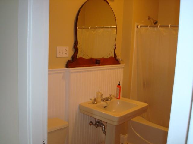 270 Huntington Road Chester, MA 01011 - Photo 5 of 9 a bathroom with a sink and mirror with toilet