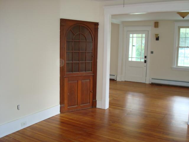 270 Huntington Road Chester, MA 01011 - Photo 8 of 9 an empty room with wooden floor and windows