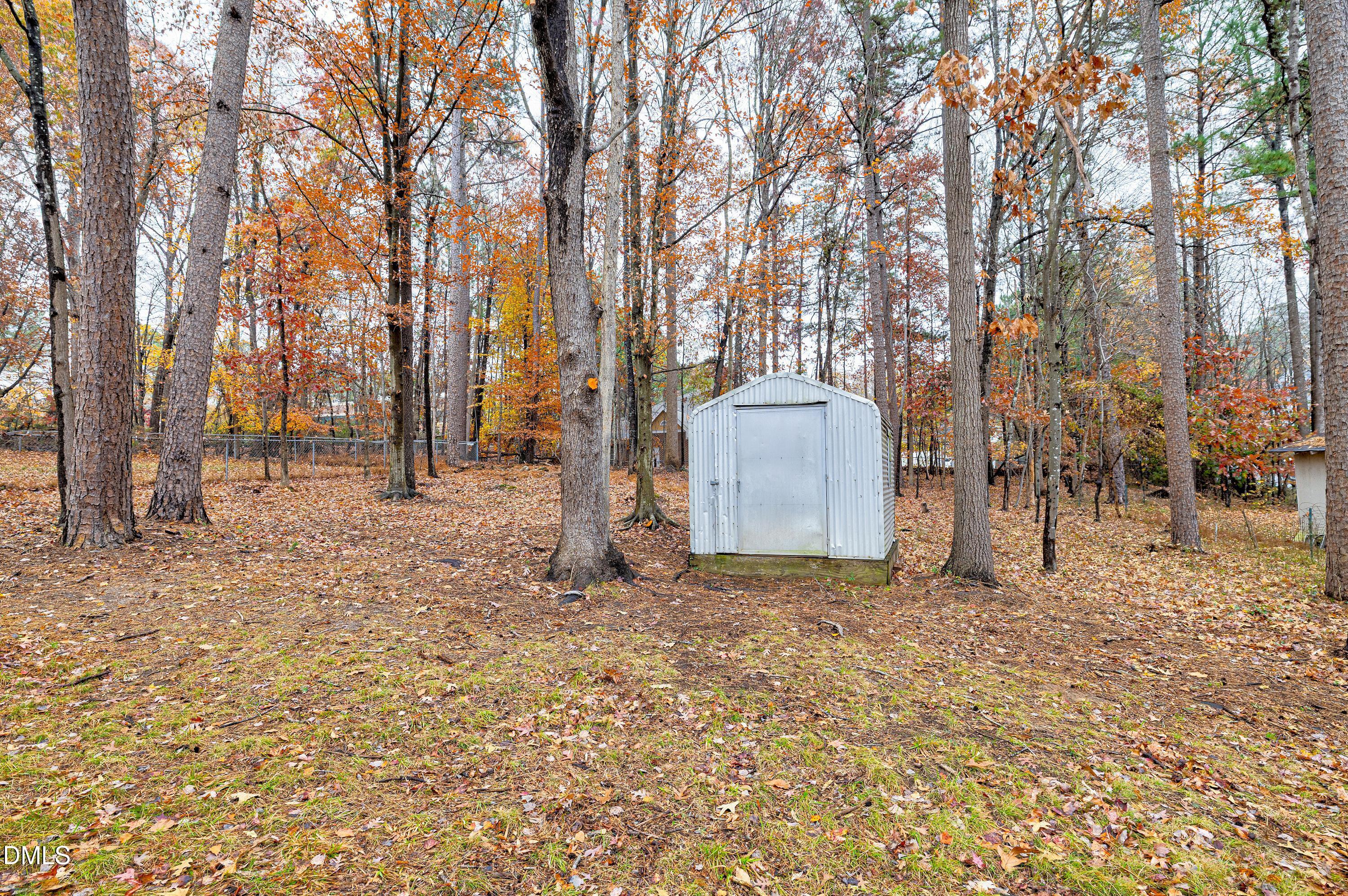 7812 Hemlock Court Raleigh, NC 27615 - Photo 24 of 25 a view of a outdoor space with trees