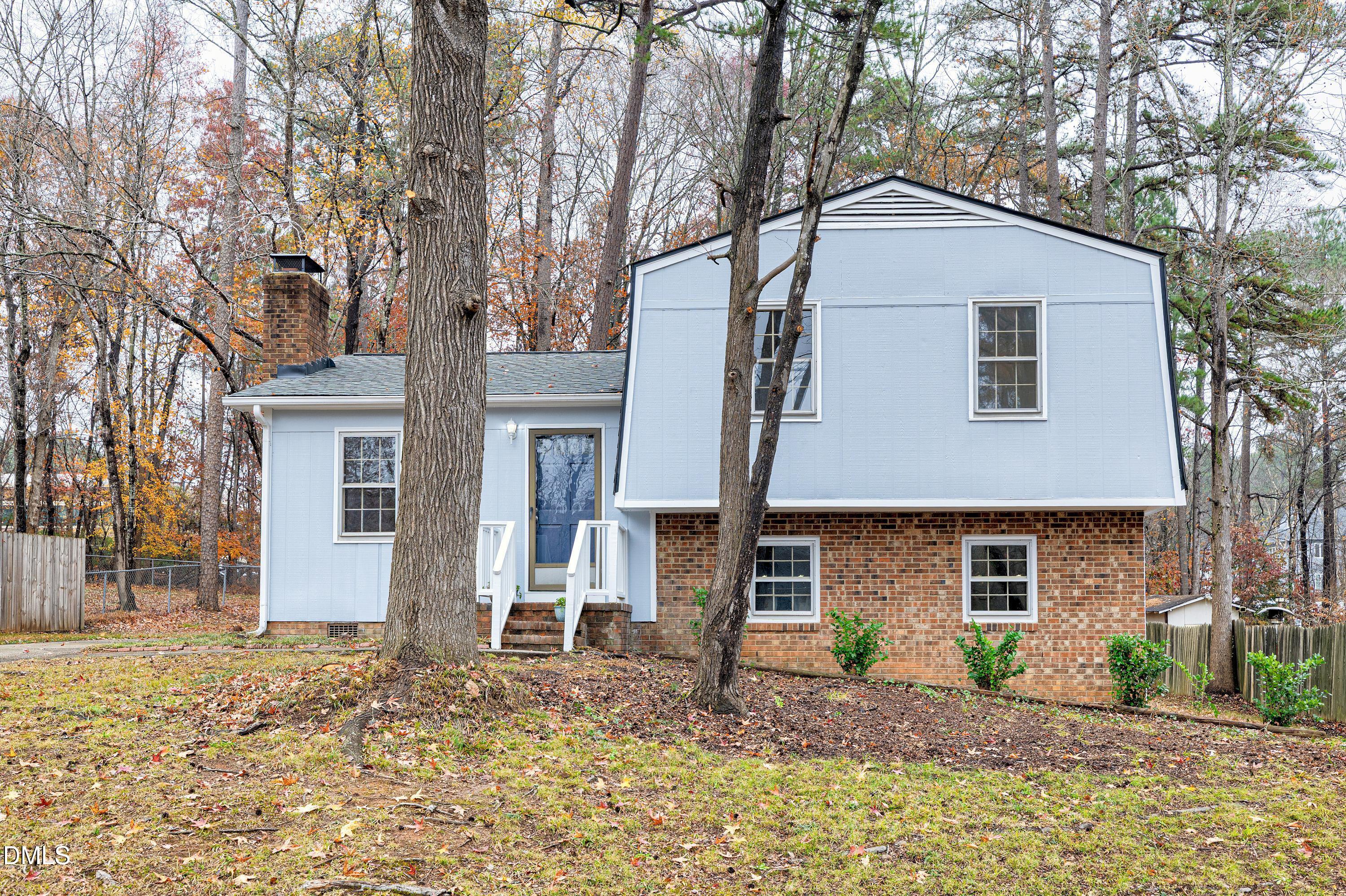 7812 Hemlock Court Raleigh, NC 27615 - Photo 25 of 25 a front view of a house with a yard