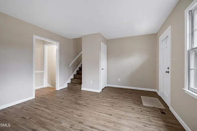 a view of entryway with wooden floor