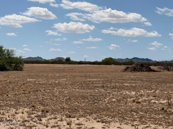 a view of lake with sunset