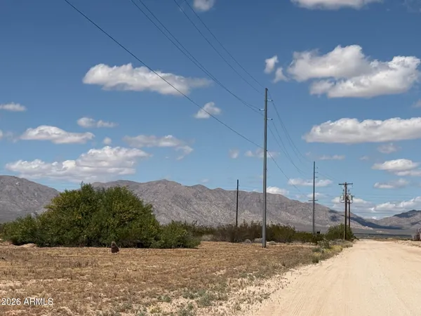 a view of a road in front of house