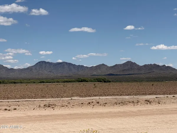 a view of lake with mountain