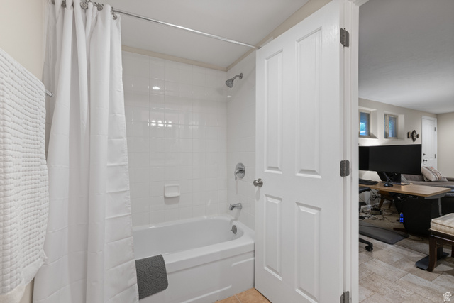 3320 Cherokee Lane Provo, UT 84604 - Photo 35 of 52 Full bathroom featuring a white tub, chrome fixtures, and white tiled walls