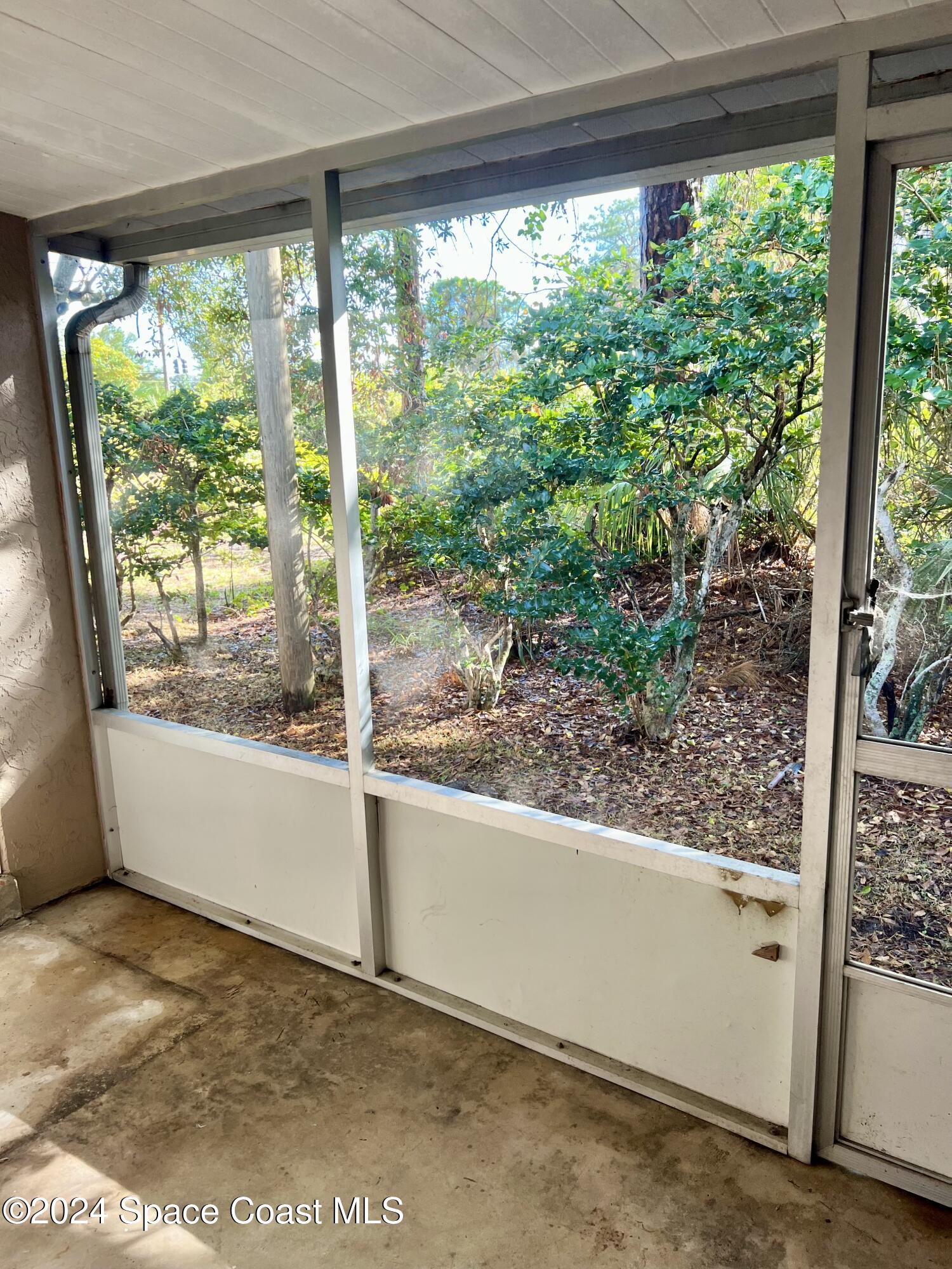 3225 Murrell Road, Unit 12 Rockledge, FL 32955 - Photo 11 of 14 a view of a room with a large window