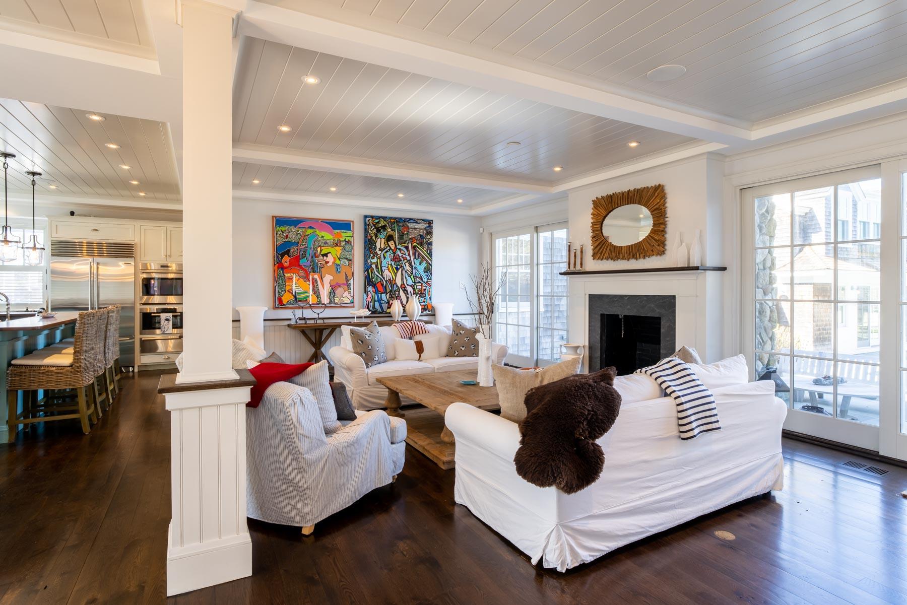 25 Pierce Lane Edgartown, MA 02539 - Photo 13 of 52 a living room with furniture and a fireplace