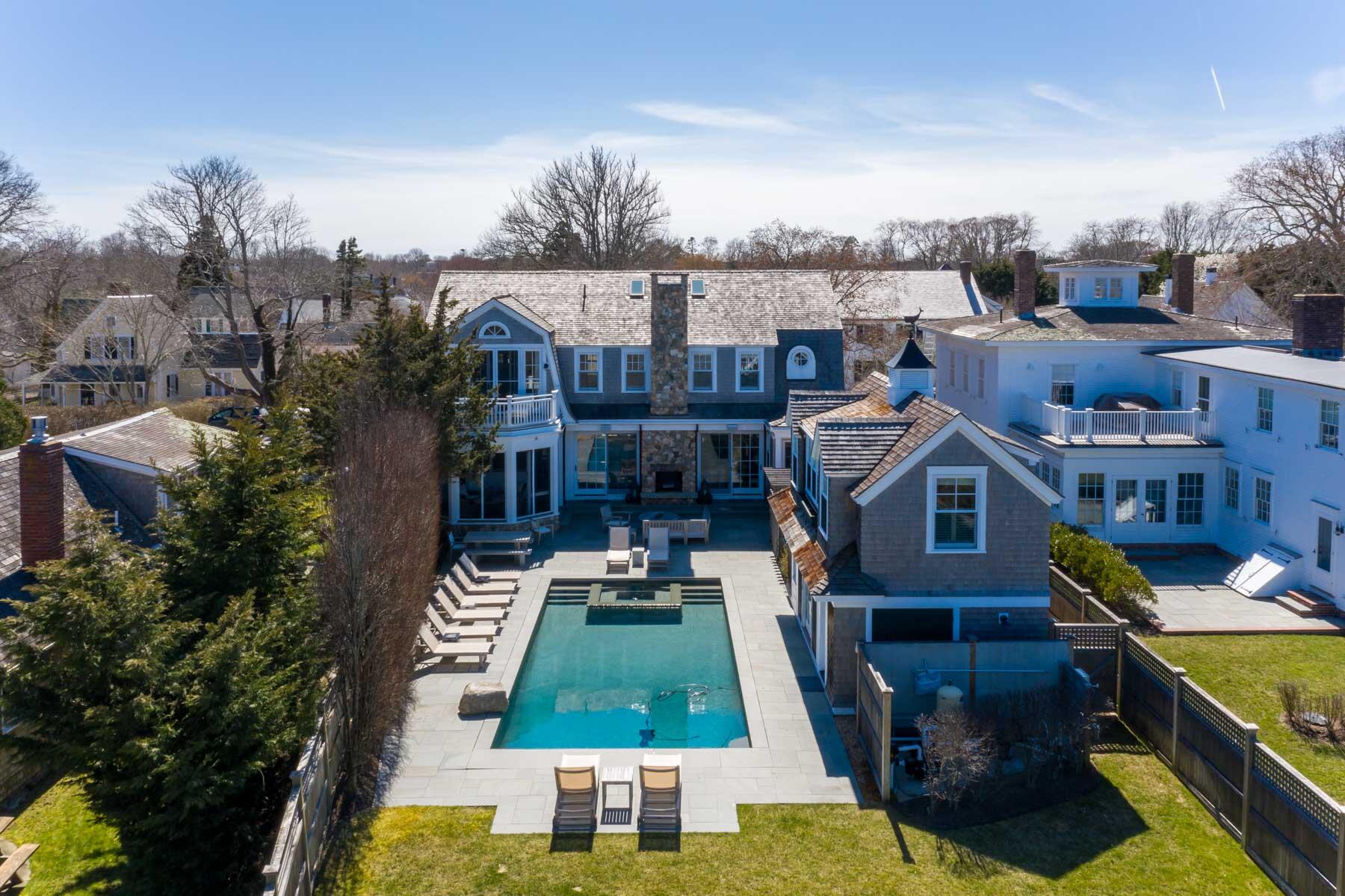 25 Pierce Lane Edgartown, MA 02539 - Photo 2 of 52 a aerial view of a house with garden space and street view