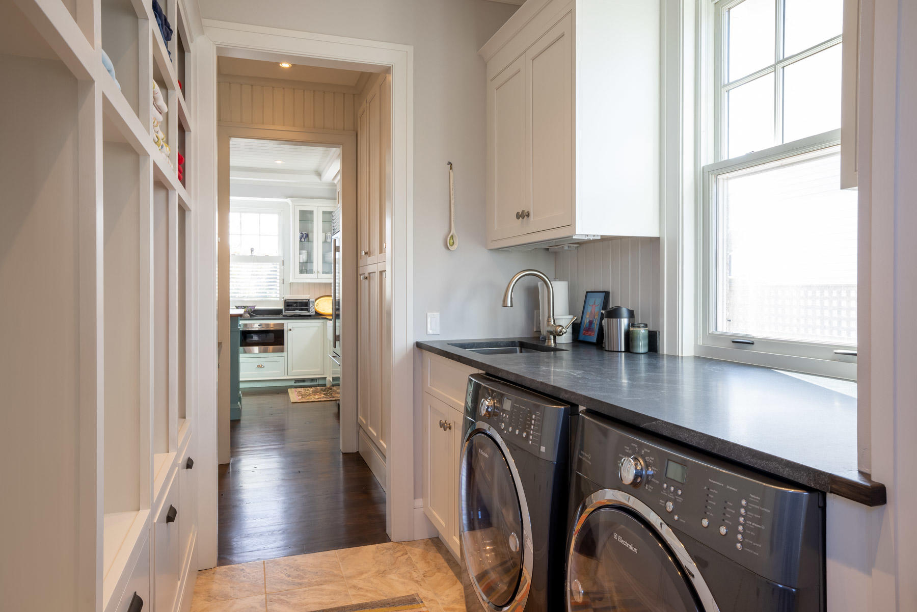 25 Pierce Lane Edgartown, MA 02539 - Photo 23 of 52 a kitchen with stainless steel appliances a sink a stove a refrigerator and cabinets