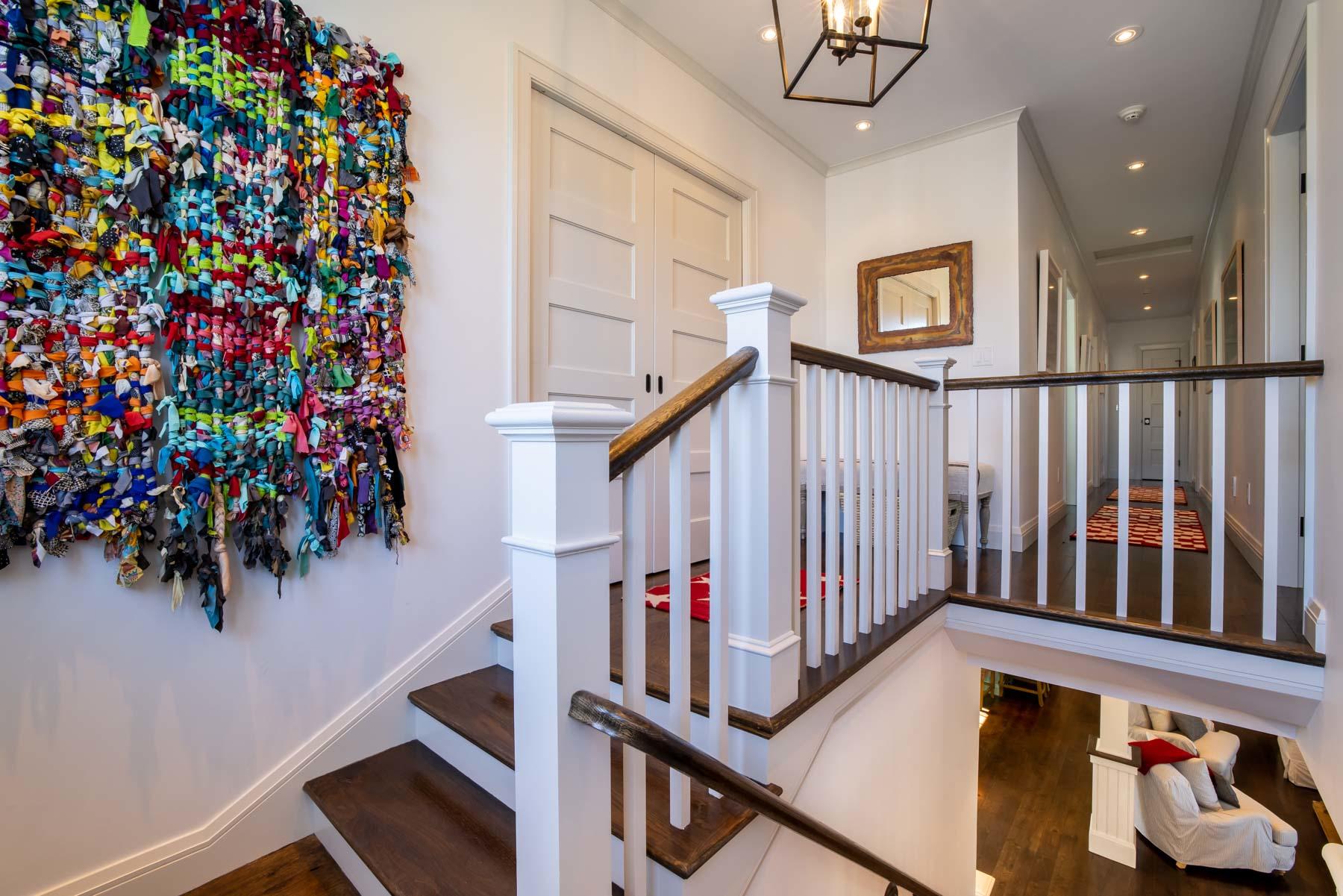 25 Pierce Lane Edgartown, MA 02539 - Photo 25 of 52 a view of entryway with wooden floor and stairs
