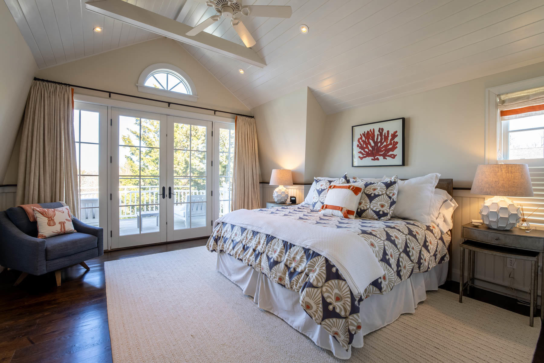 25 Pierce Lane Edgartown, MA 02539 - Photo 26 of 52 a spacious bedroom with a large bed and a large window