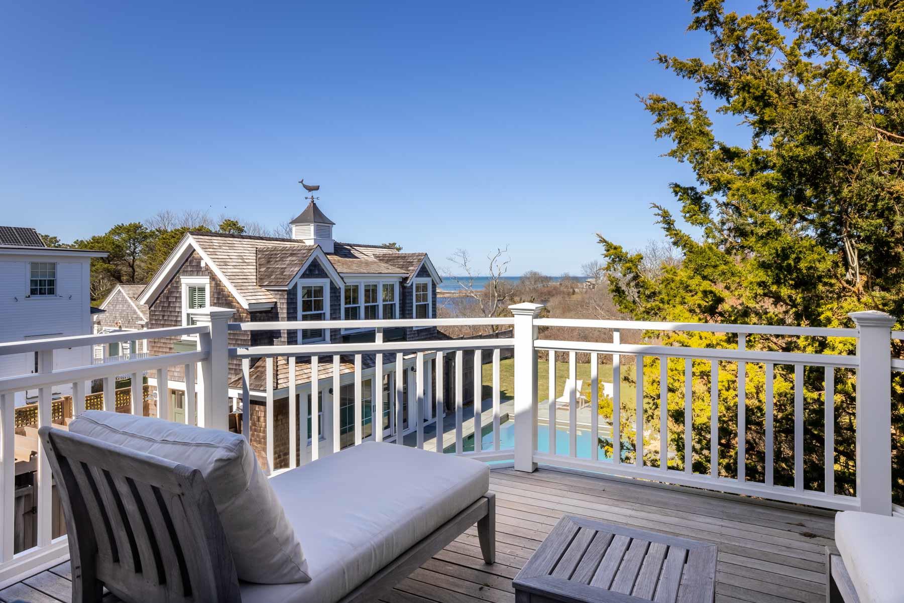 25 Pierce Lane Edgartown, MA 02539 - Photo 28 of 52 a view of a deck with wooden floor and fence