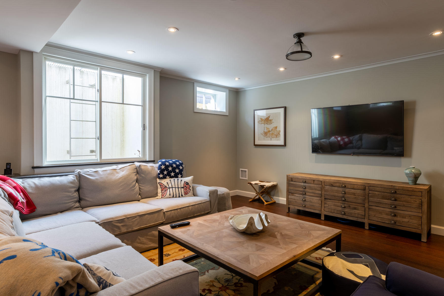 25 Pierce Lane Edgartown, MA 02539 - Photo 36 of 52 a living room with furniture and a flat screen tv