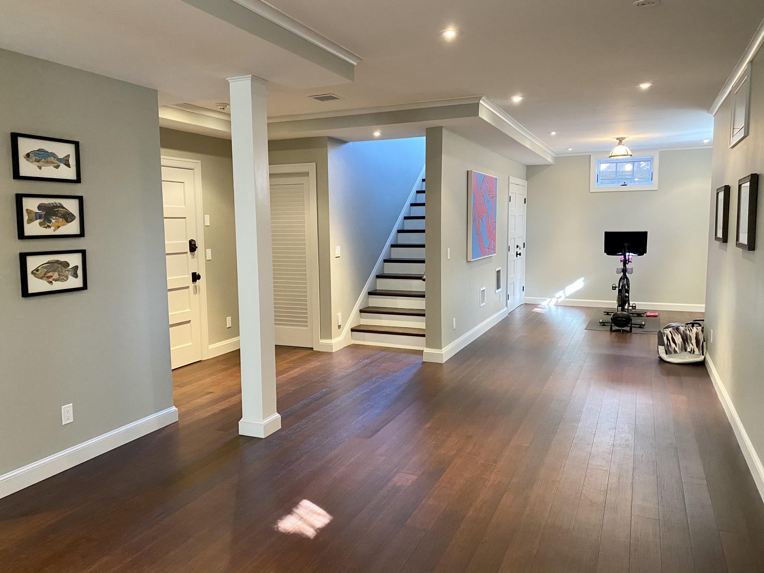 25 Pierce Lane Edgartown, MA 02539 - Photo 37 of 52 a view of a room with wooden floor and stairs