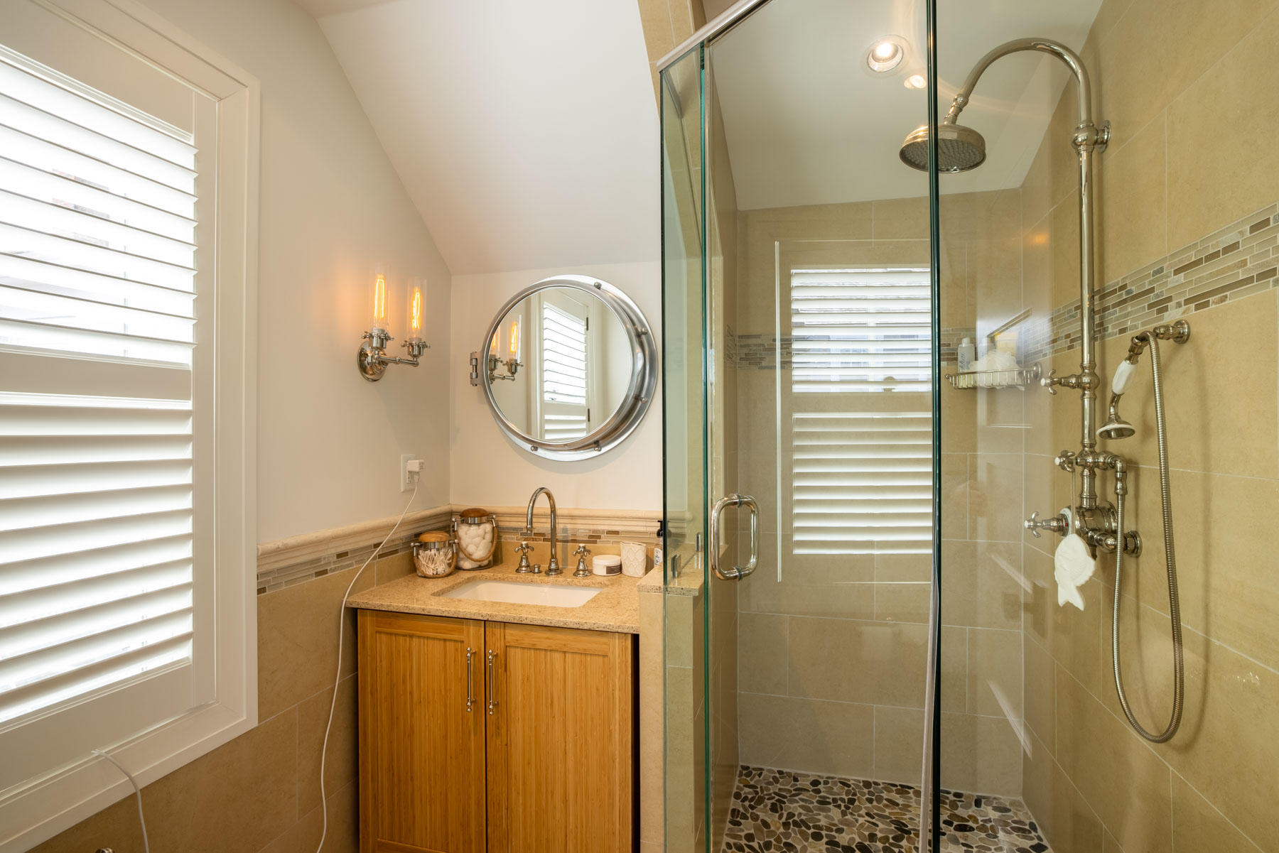 25 Pierce Lane Edgartown, MA 02539 - Photo 40 of 52 a bathroom with a mirror shower vanity and a sink