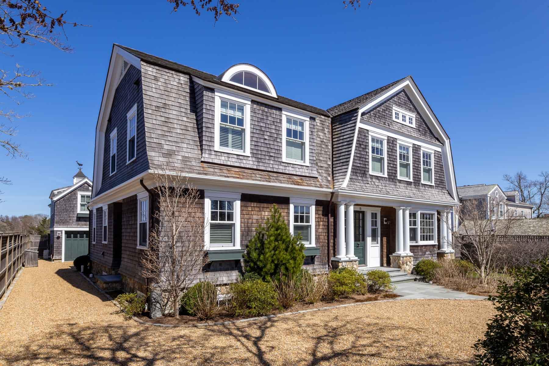 25 Pierce Lane Edgartown, MA 02539 - Photo 42 of 52 a front view of a house with a yard