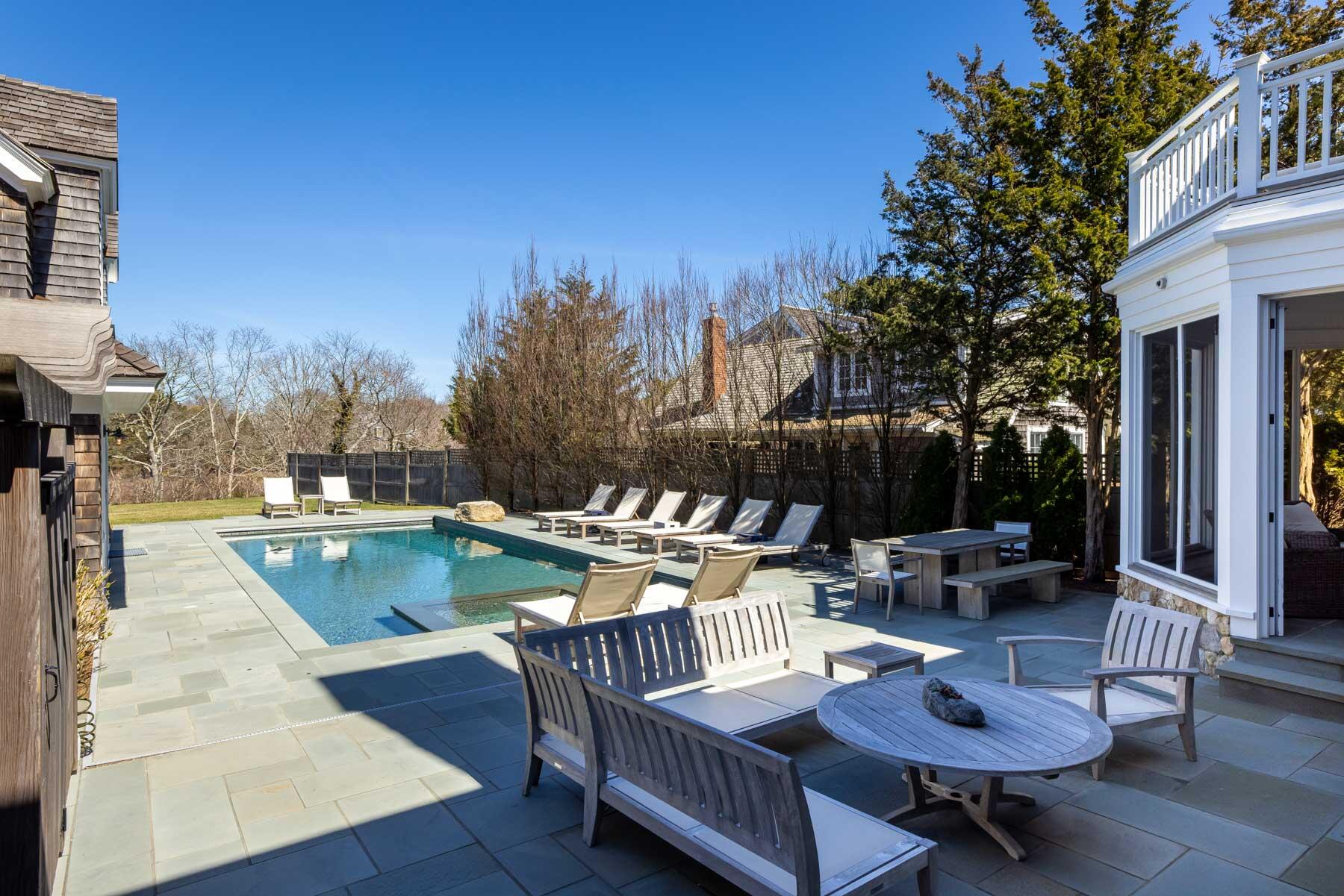 25 Pierce Lane Edgartown, MA 02539 - Photo 43 of 52 a view of a patio with swimming pool and sitting area