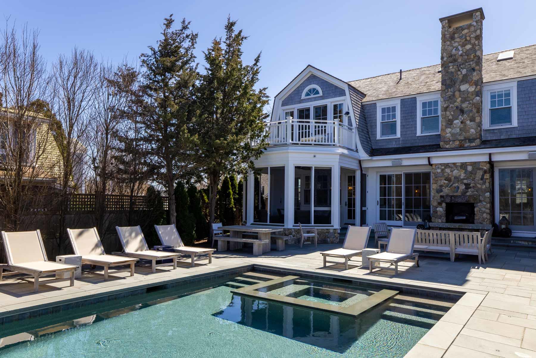 25 Pierce Lane Edgartown, MA 02539 - Photo 46 of 52 a front view of a house with swimming pool and sitting area
