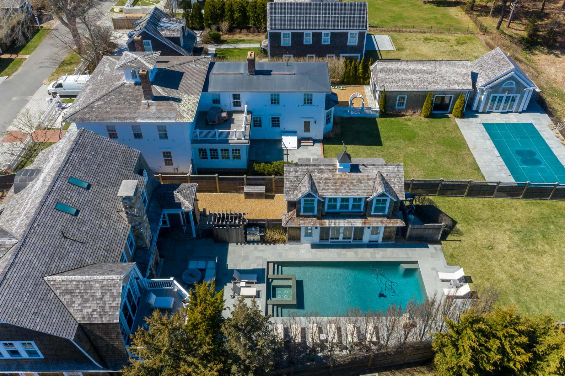 25 Pierce Lane Edgartown, MA 02539 - Photo 49 of 52 a view of building with outdoor space and seating area