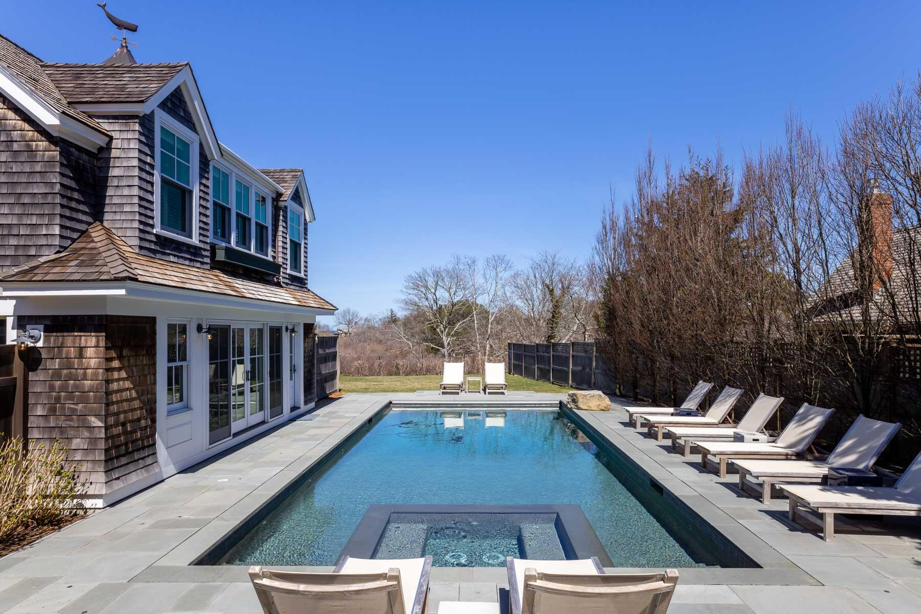 25 Pierce Lane Edgartown, MA 02539 - Photo 7 of 52 a swimming pool with outdoor seating and yard