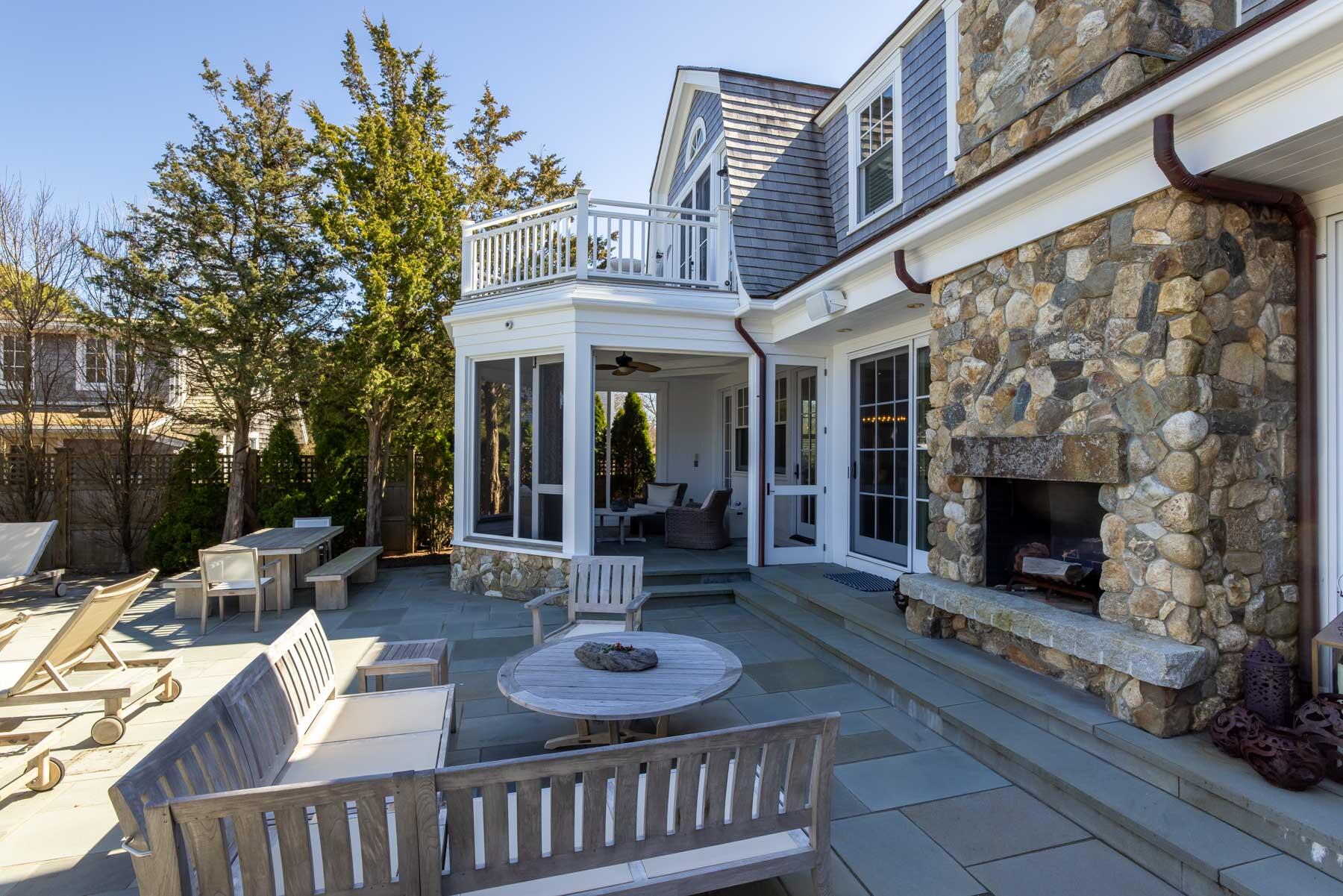 25 Pierce Lane Edgartown, MA 02539 - Photo 8 of 52 a front view of a house with outdoor seating