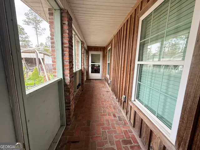 a view of a house with a porch