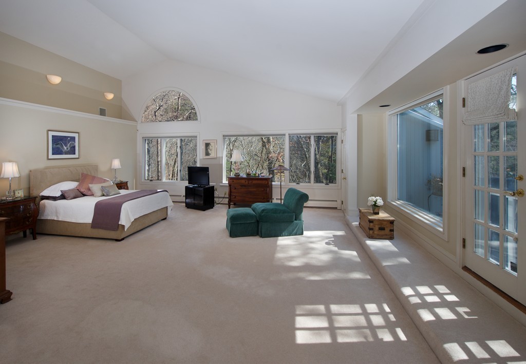82 Sudbury Road Weston, MA 02493 - Photo 12 of 23 a bedroom with furniture and a large window