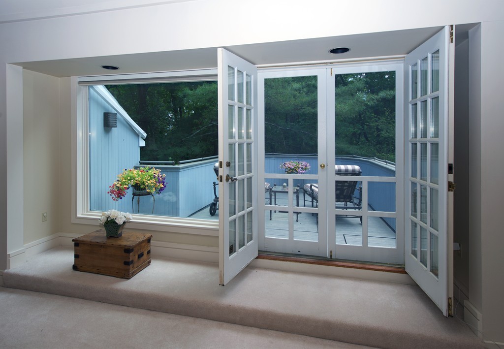 82 Sudbury Road Weston, MA 02493 - Photo 14 of 23 a living room with furniture and a potted plant