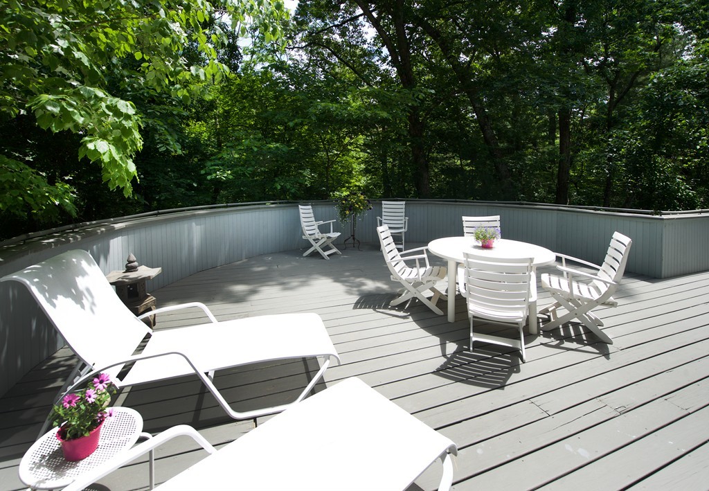 82 Sudbury Road Weston, MA 02493 - Photo 15 of 23 a view of backyard with seating area and trees