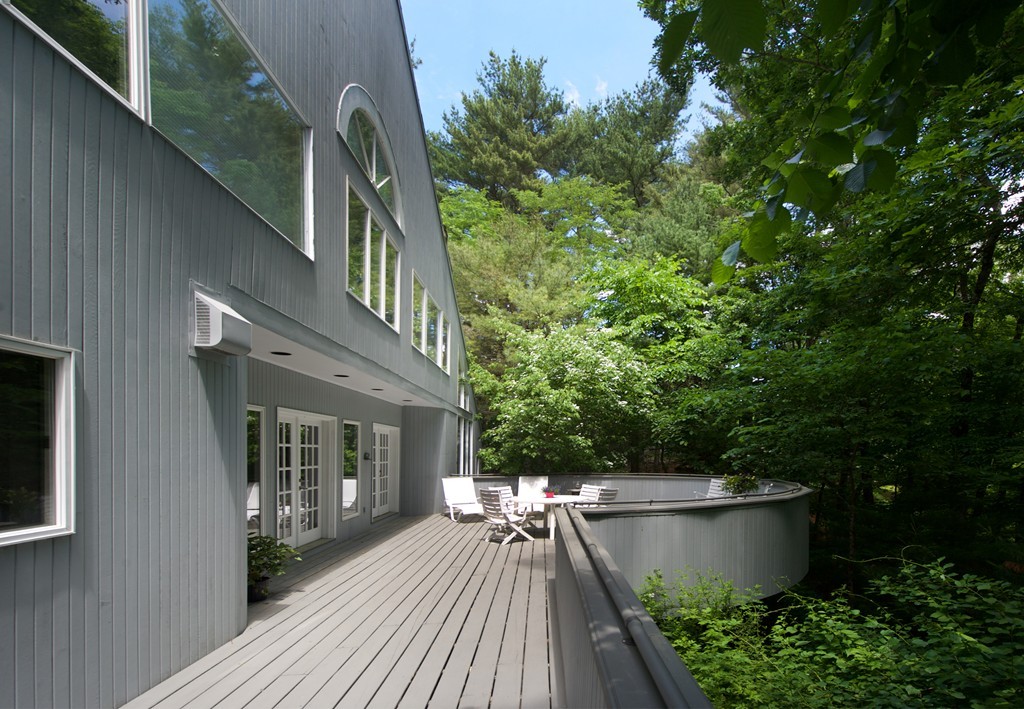 82 Sudbury Road Weston, MA 02493 - Photo 16 of 23 a view of balcony with furniture and garden