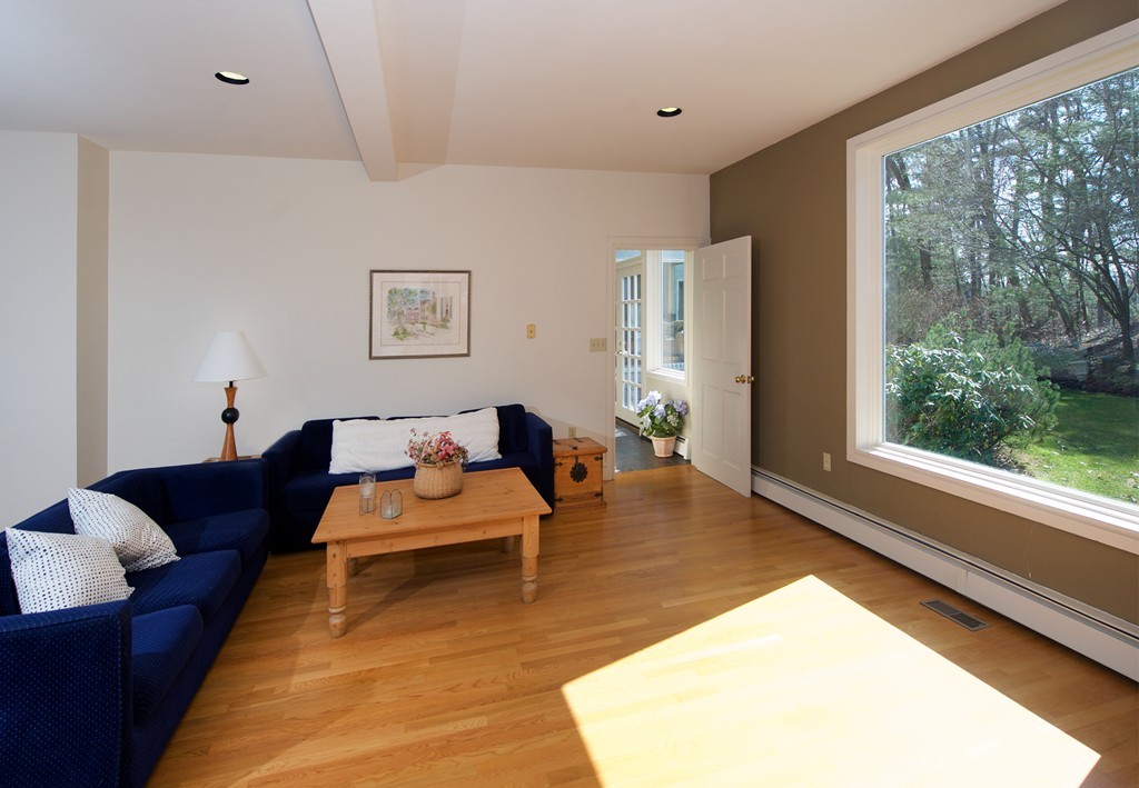 82 Sudbury Road Weston, MA 02493 - Photo 17 of 23 a living room with furniture and a large window