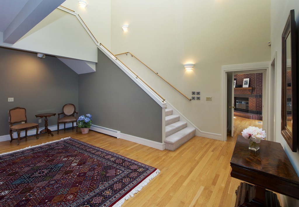 82 Sudbury Road Weston, MA 02493 - Photo 18 of 23 a living room with furniture and a rug