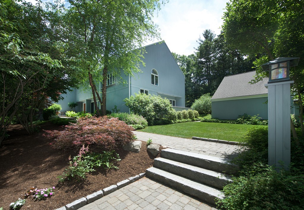 82 Sudbury Road Weston, MA 02493 - Photo 21 of 23 a view of a house with a yard and a large tree
