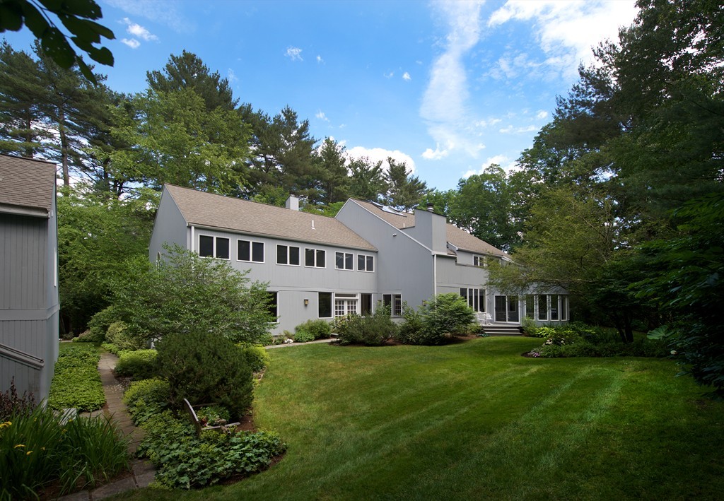 82 Sudbury Road Weston, MA 02493 - Photo 23 of 23 a front view of a house with a garden