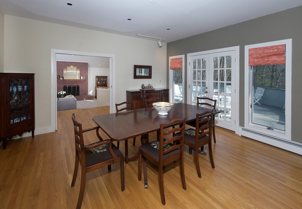 82 Sudbury Road Weston, MA 02493 - Photo 4 of 23 a view of a dining room with furniture and wooden floor