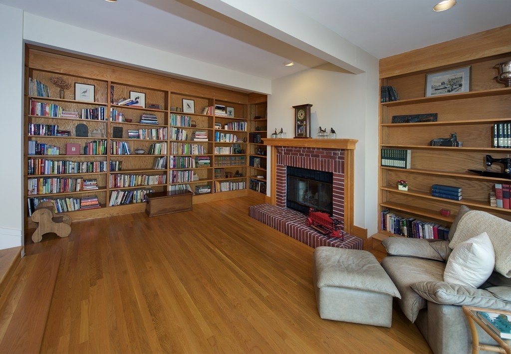 82 Sudbury Road Weston, MA 02493 - Photo 10 of 23 a living room with furniture and a fireplace