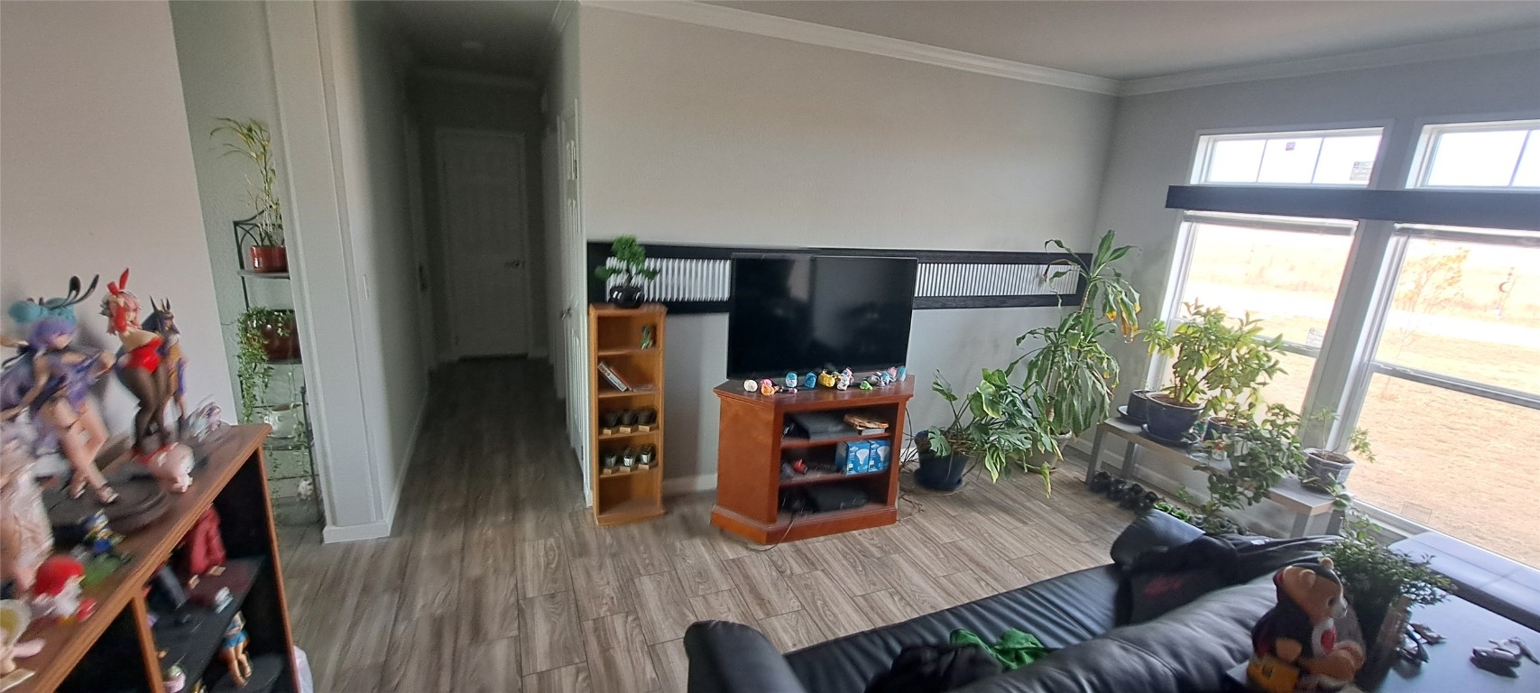 3432 County Road 206 Cameron, TX 76520 - Photo 35 of 39 a living room with furniture and a flat screen tv