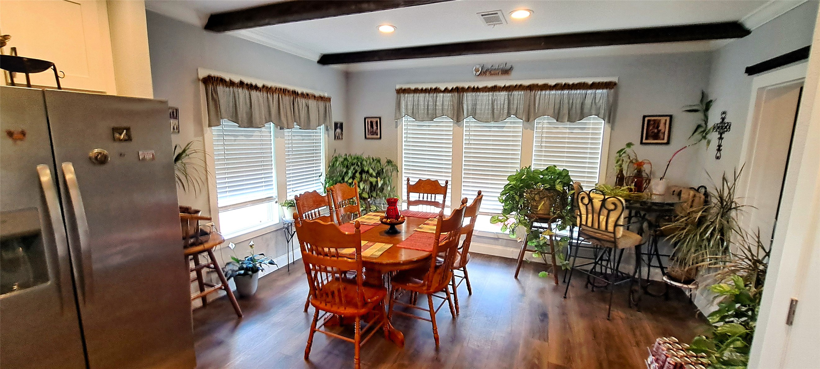 3432 County Road 206 Cameron, TX 76520 - Photo 6 of 39 Dining room featuring plenty of natural light, dark wood-style flooring, beamed ceiling, and recessed lighting