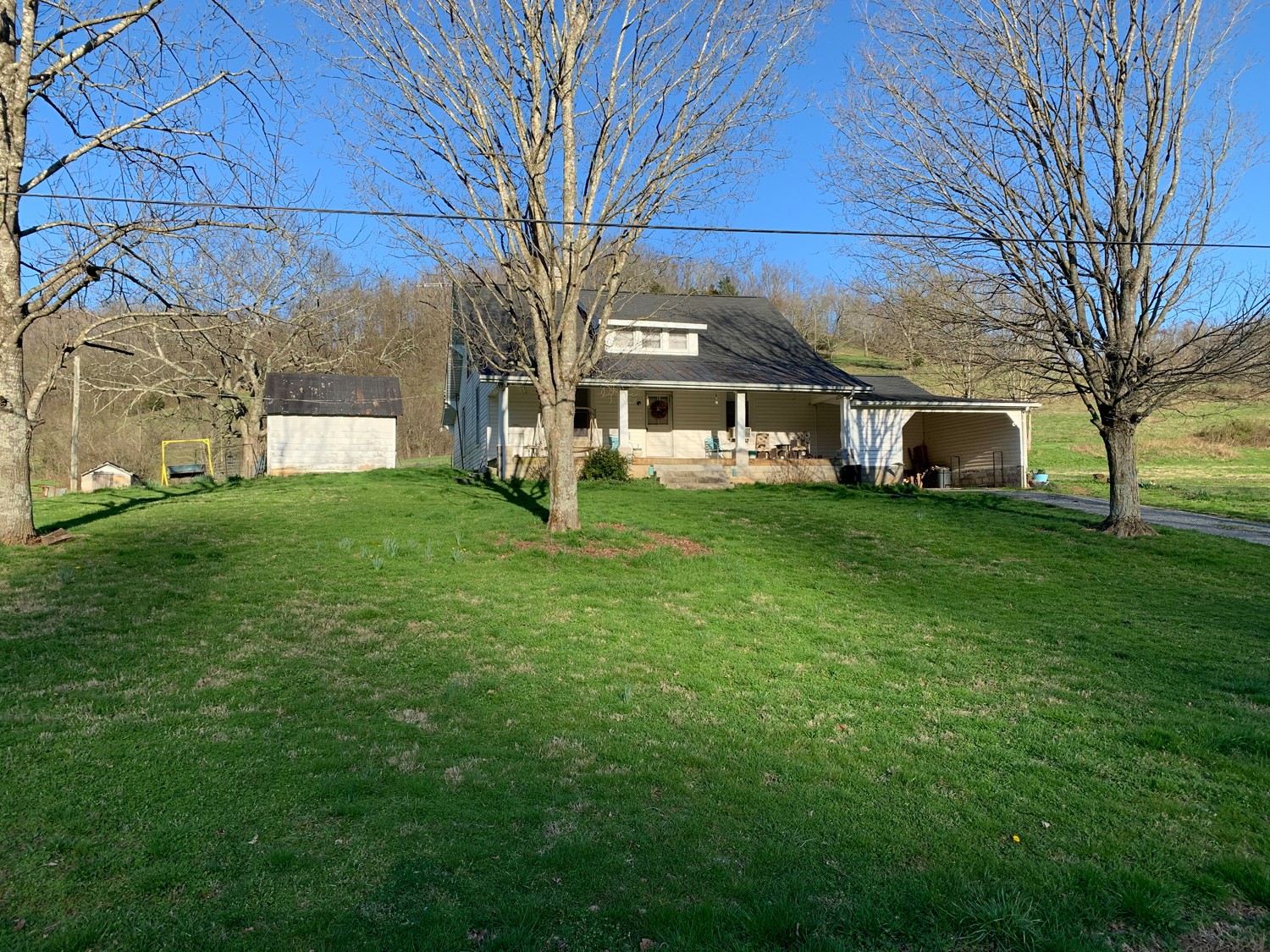 a view of a yard in front of house