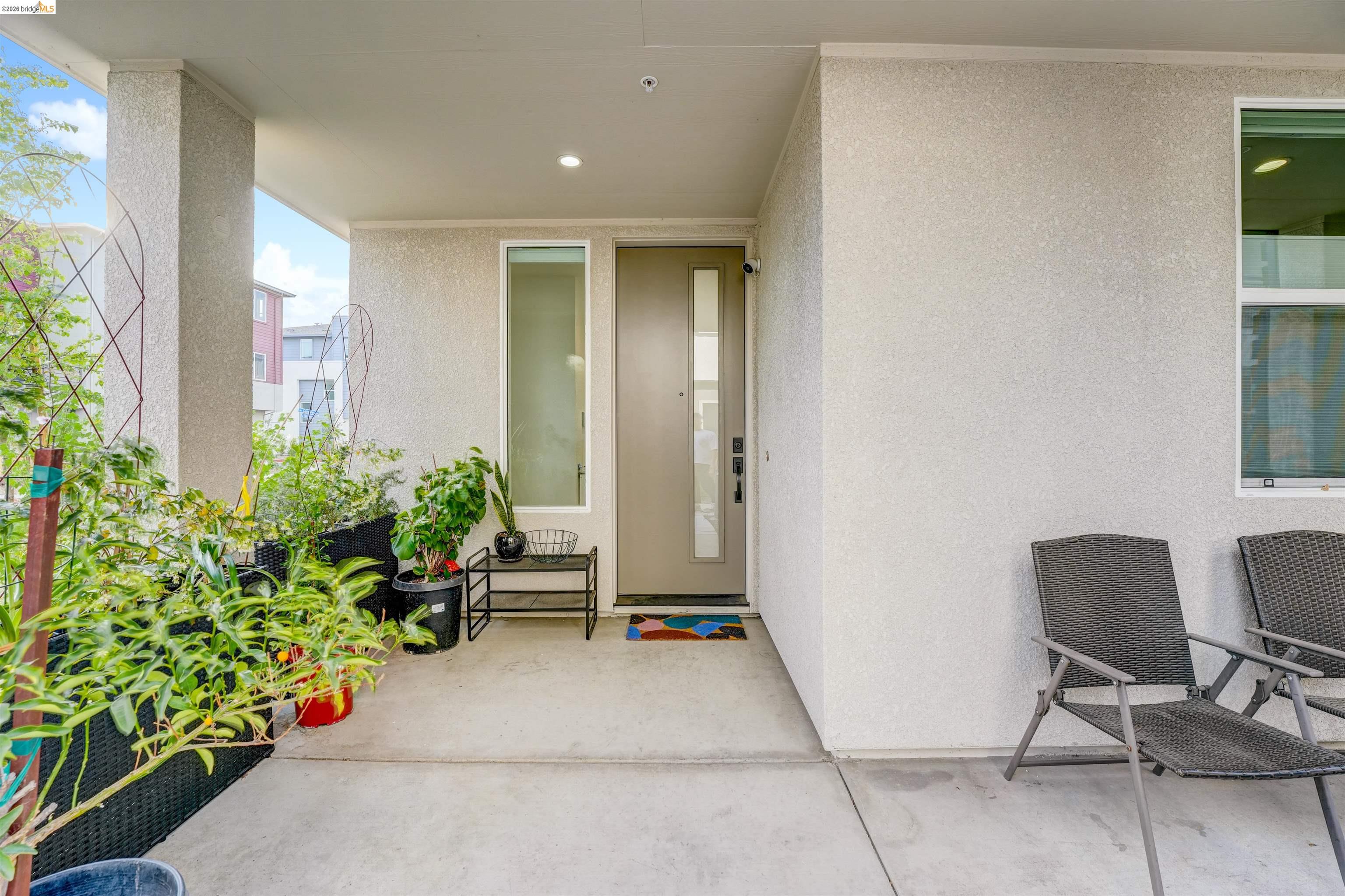 7101 Melon Court San Ramon, CA 94583 - Photo 3 of 58 a living room with furniture and a potted plant