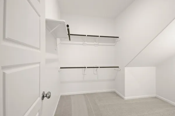 a view of an empty walk in closet