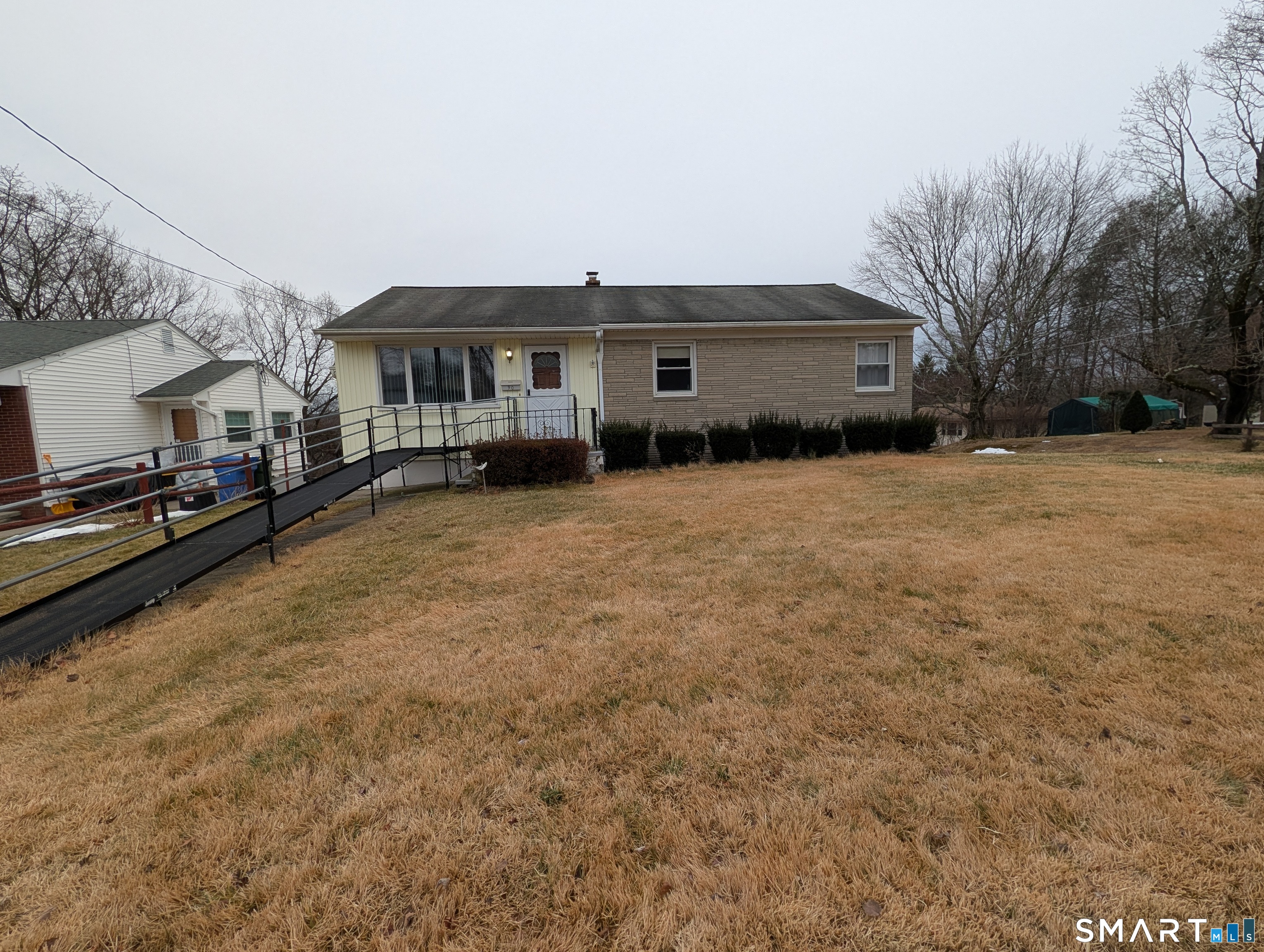 90 Hunthill Road Waterbury, CT 06705 - Photo 2 of 15 a view of a house with a yard