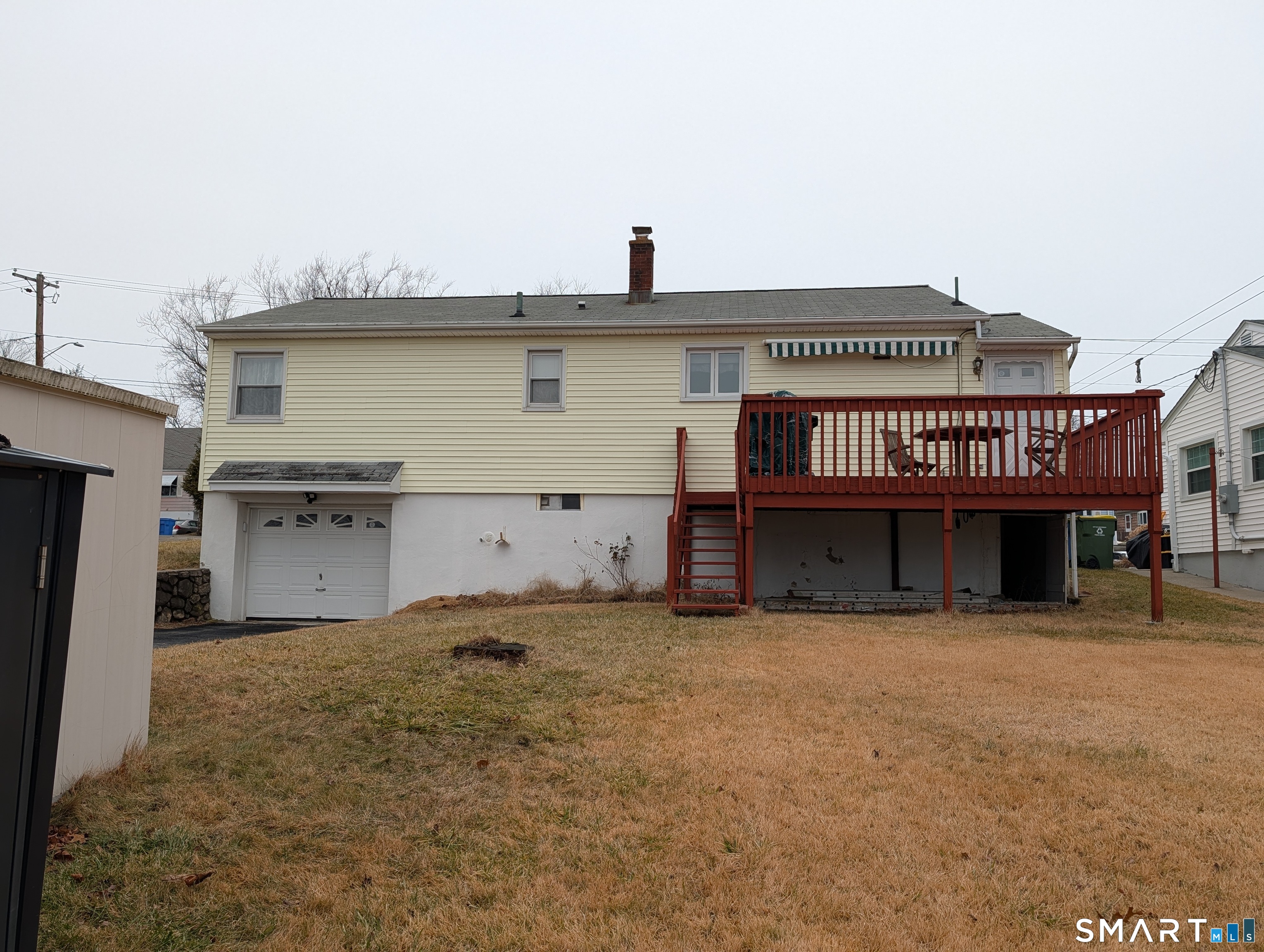 90 Hunthill Road Waterbury, CT 06705 - Photo 4 of 15 a view of a house with a garage