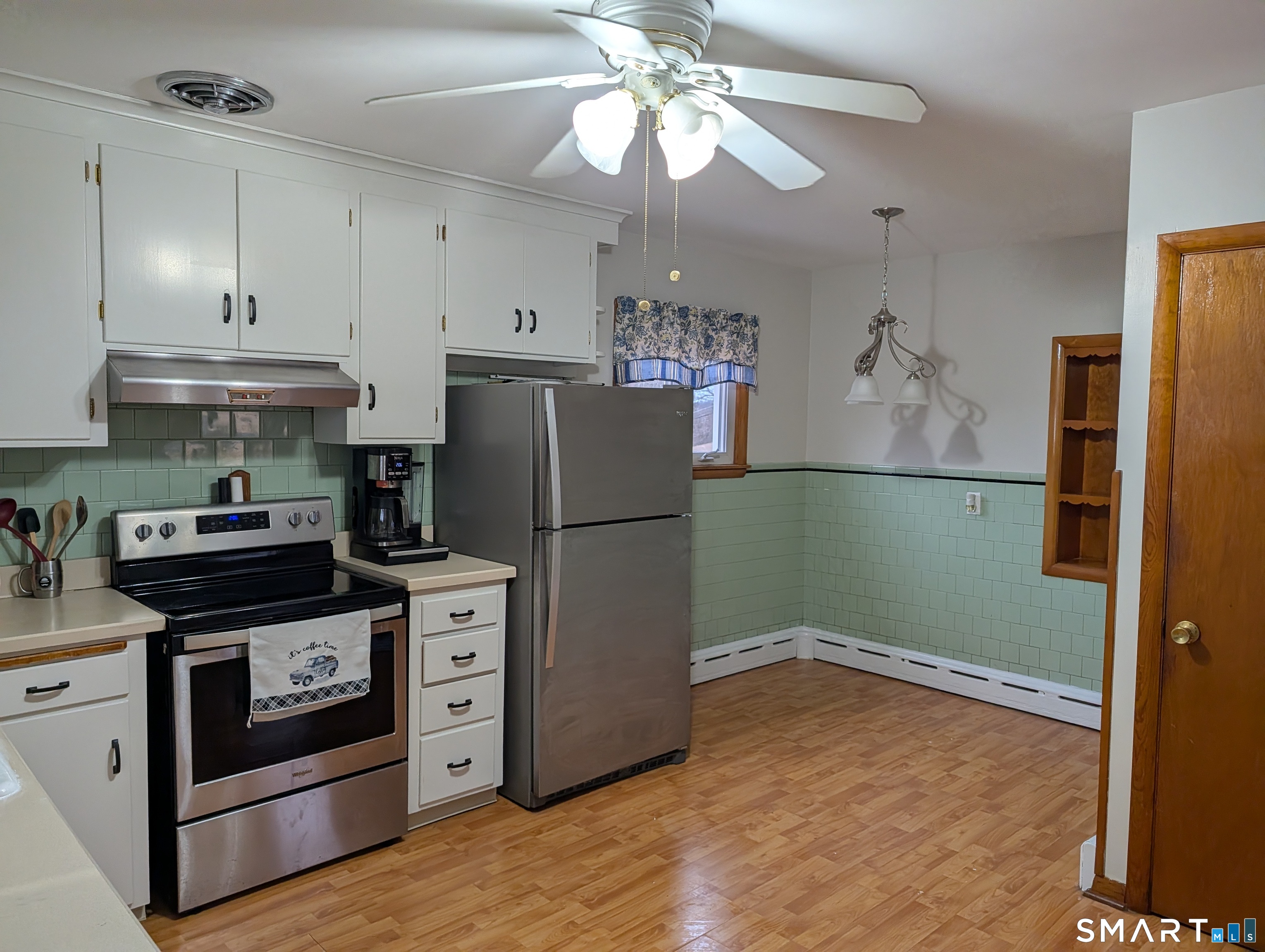 90 Hunthill Road Waterbury, CT 06705 - Photo 8 of 15 a kitchen with stainless steel appliances granite countertop a refrigerator a stove a sink and a refrigerator