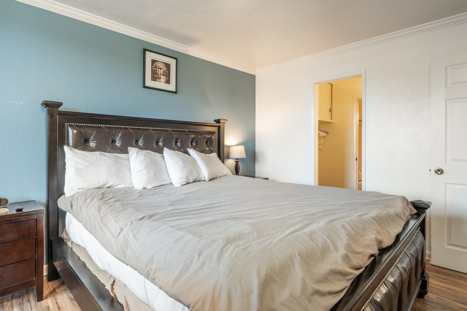 137 Laurel Mountain Road, Unit 312 Mammoth Lakes, CA 93546 - Photo 16 of 37 a large bed sitting in a bedroom next to a window