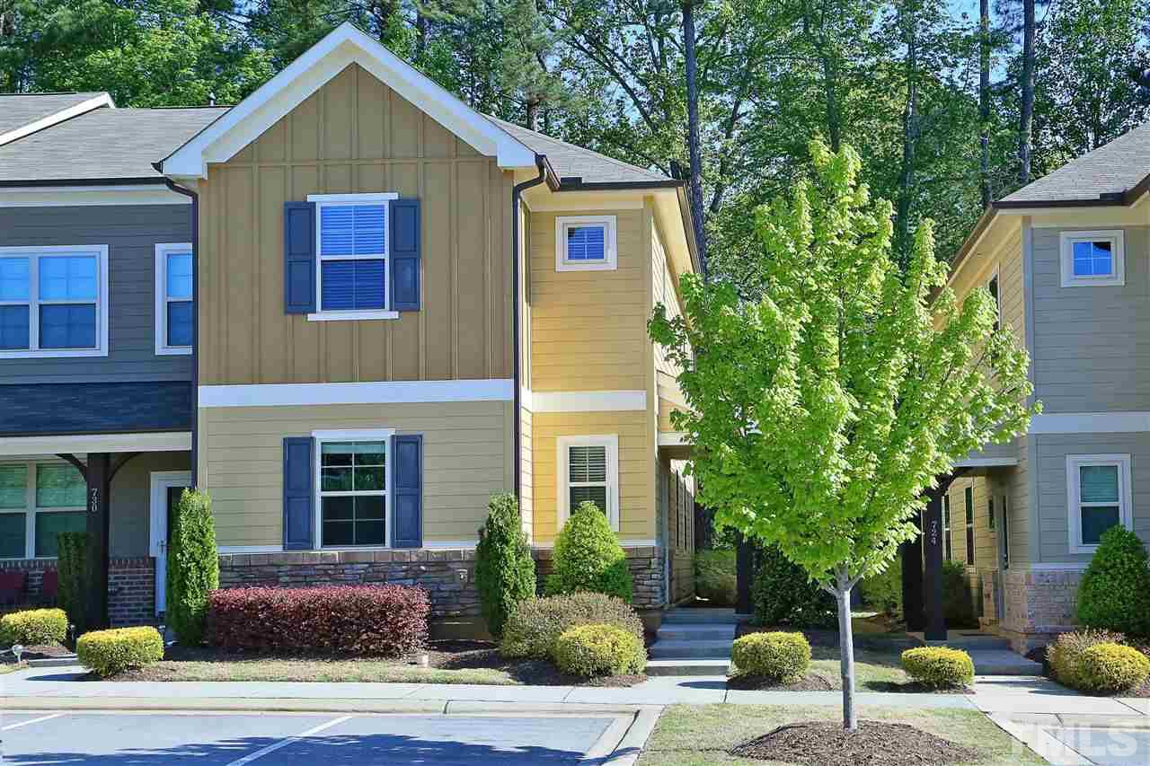 728 Wickham Ridge Road Apex, NC 27539 - Photo 1 of 21 a view of a yard in front of house