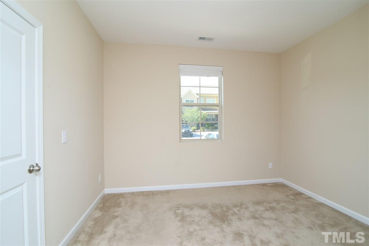 728 Wickham Ridge Road Apex, NC 27539 - Photo 15 of 21 an empty room with a window